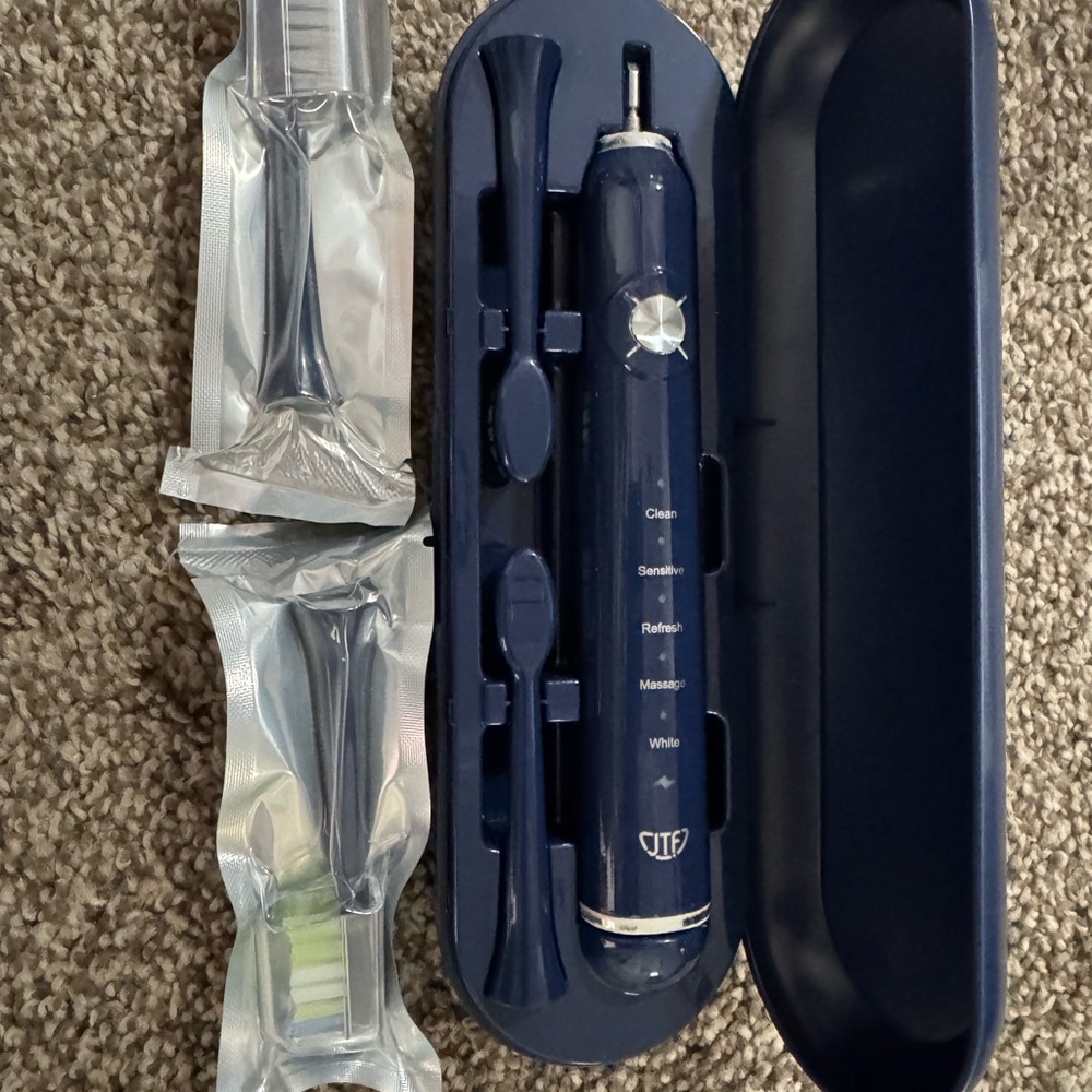 Electric Toothbrush with Case and Extra Heads